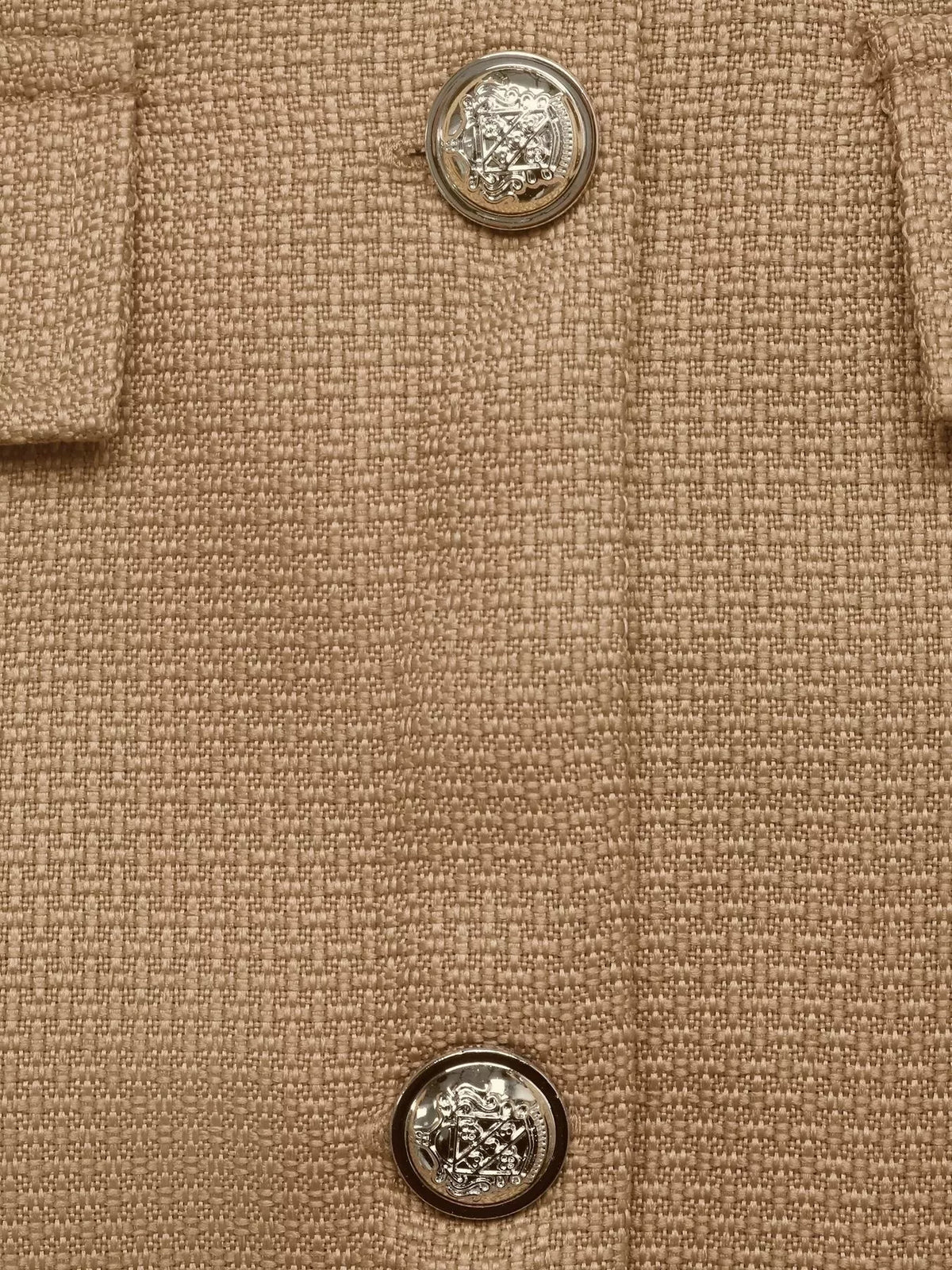 Tan textured cropped jacket with gold-tone buttons, gold-tone button close-up