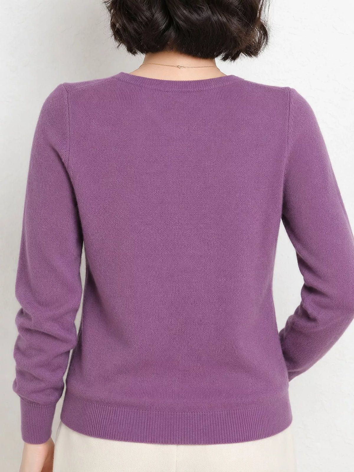Purple v-neck long sleeve knit top, back view