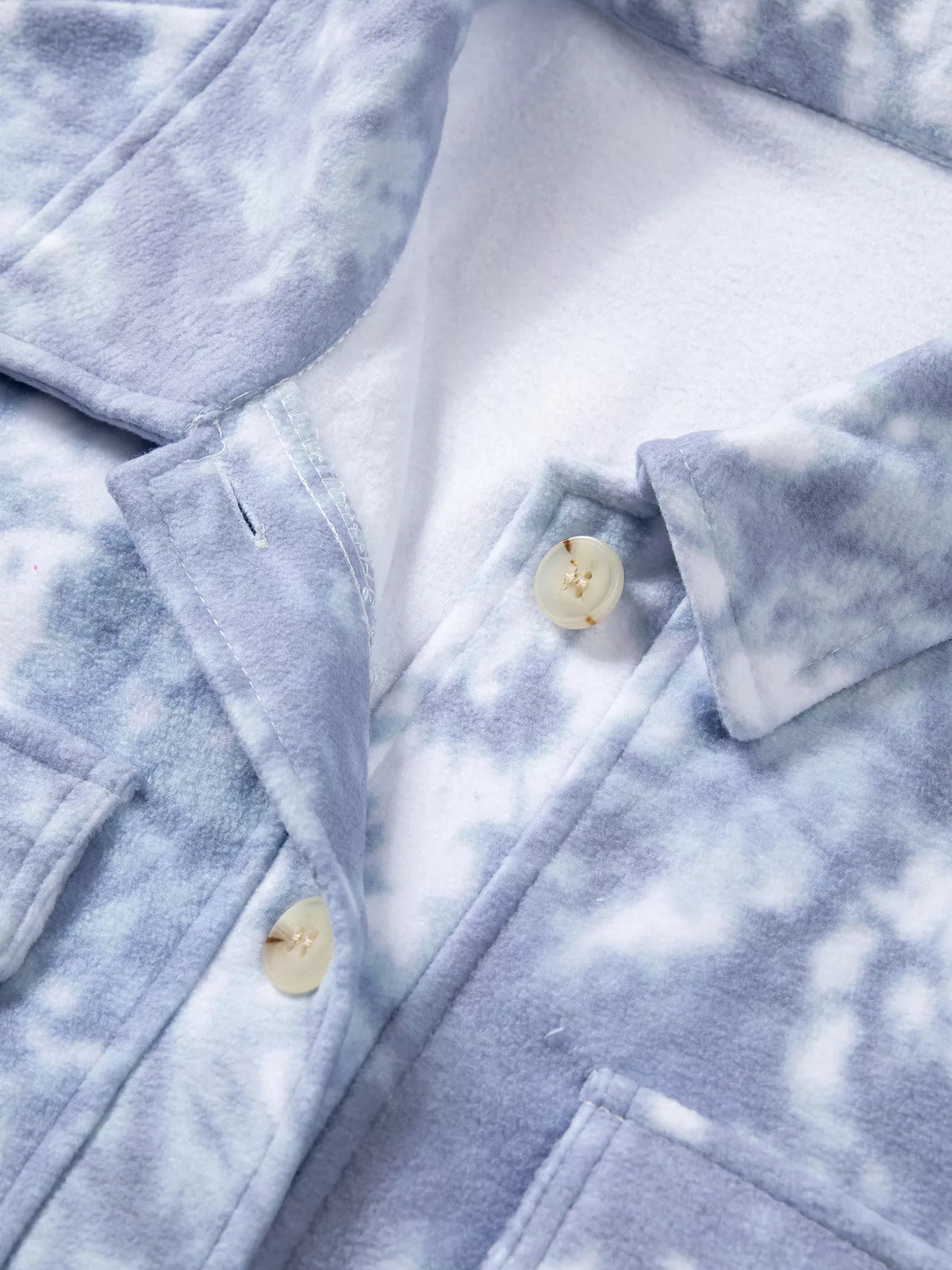 Button placket on light blue abstract print fuzzy collar tunic jacket