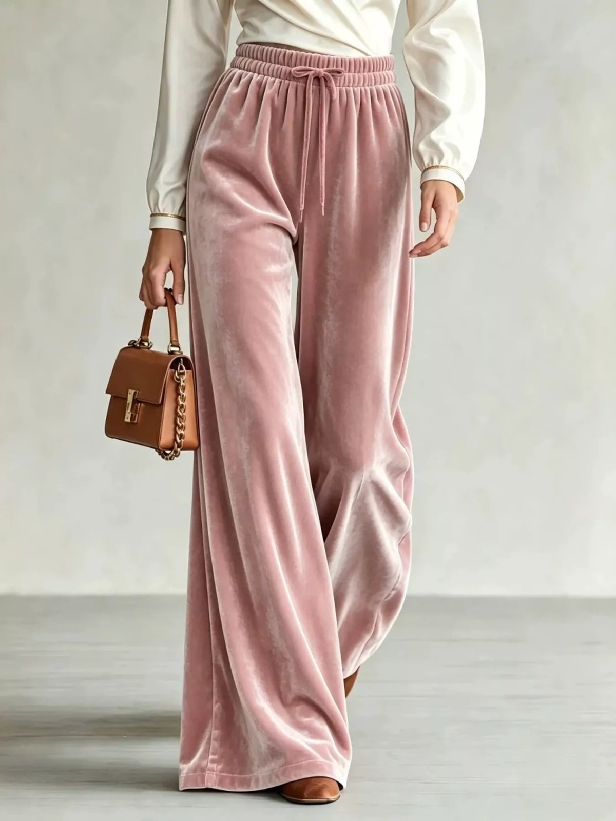 Pink wide-leg drawstring velvet pants, front view