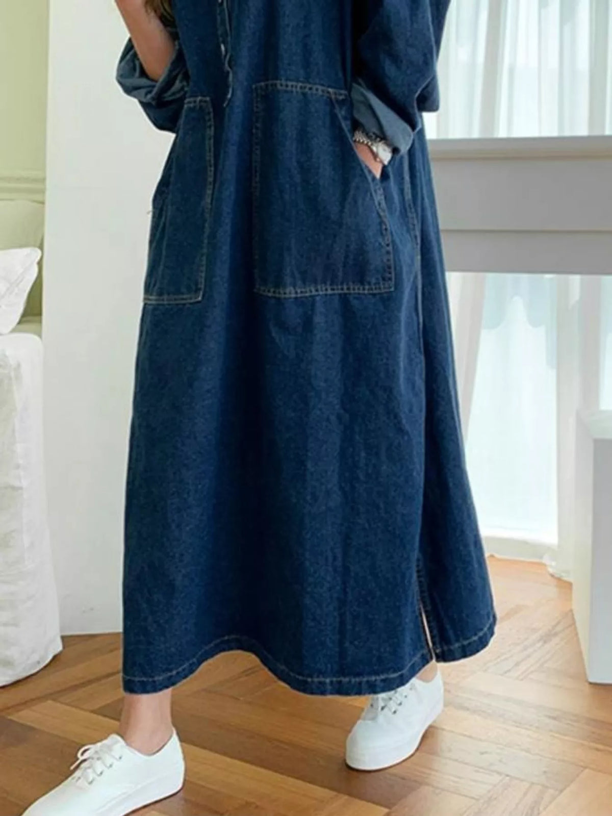 Blue button front denim shirt dress, side view