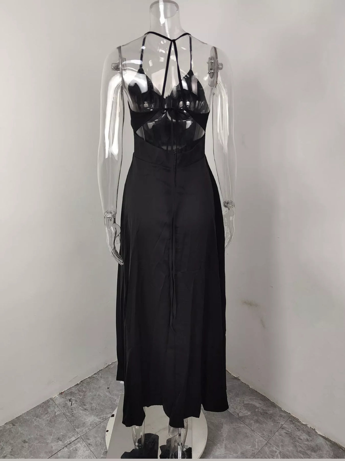 Black sleeveless high slit maxi dress, back view