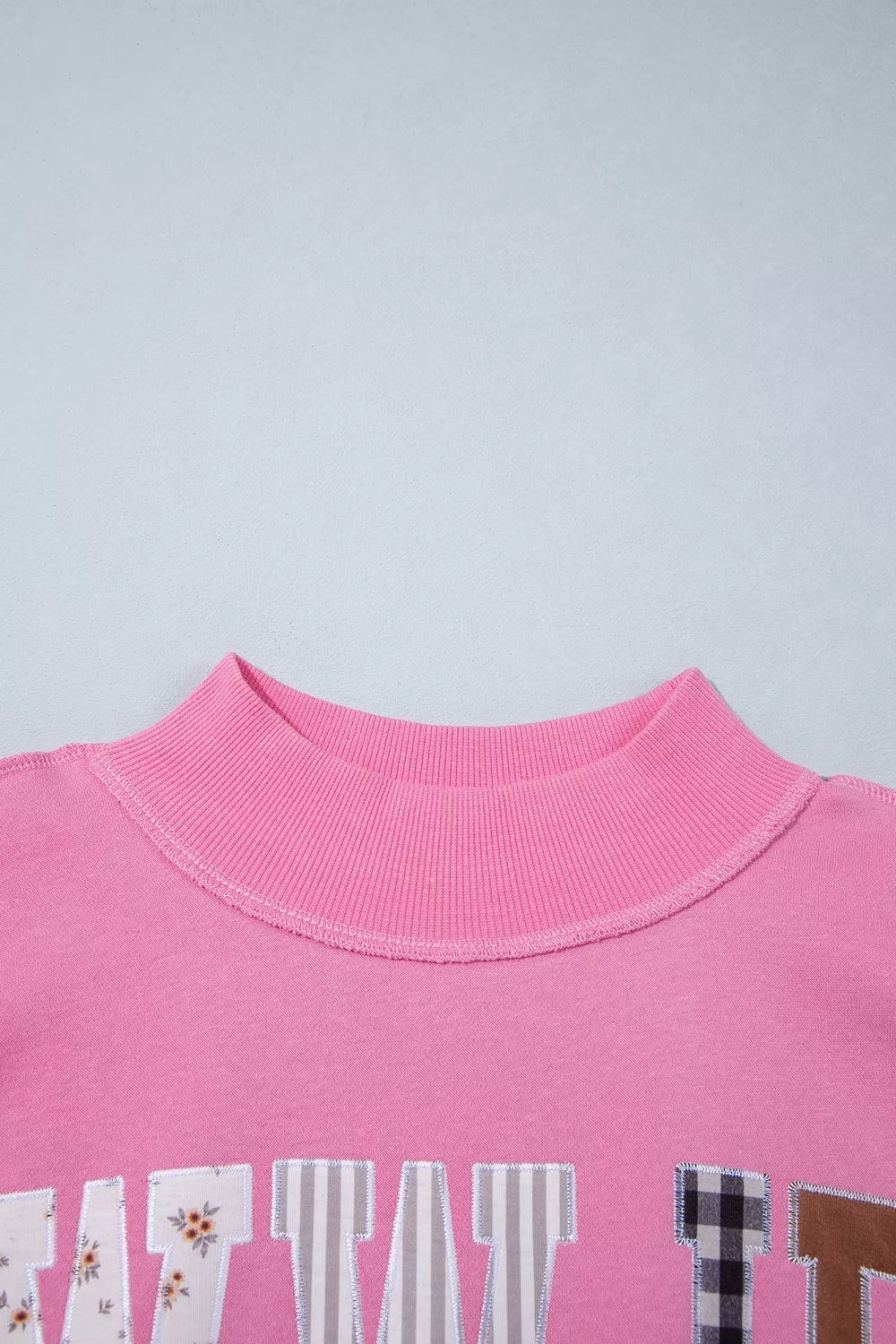 WWJD Embroidered Patch Mock Neck Sweatshirt — construction details
