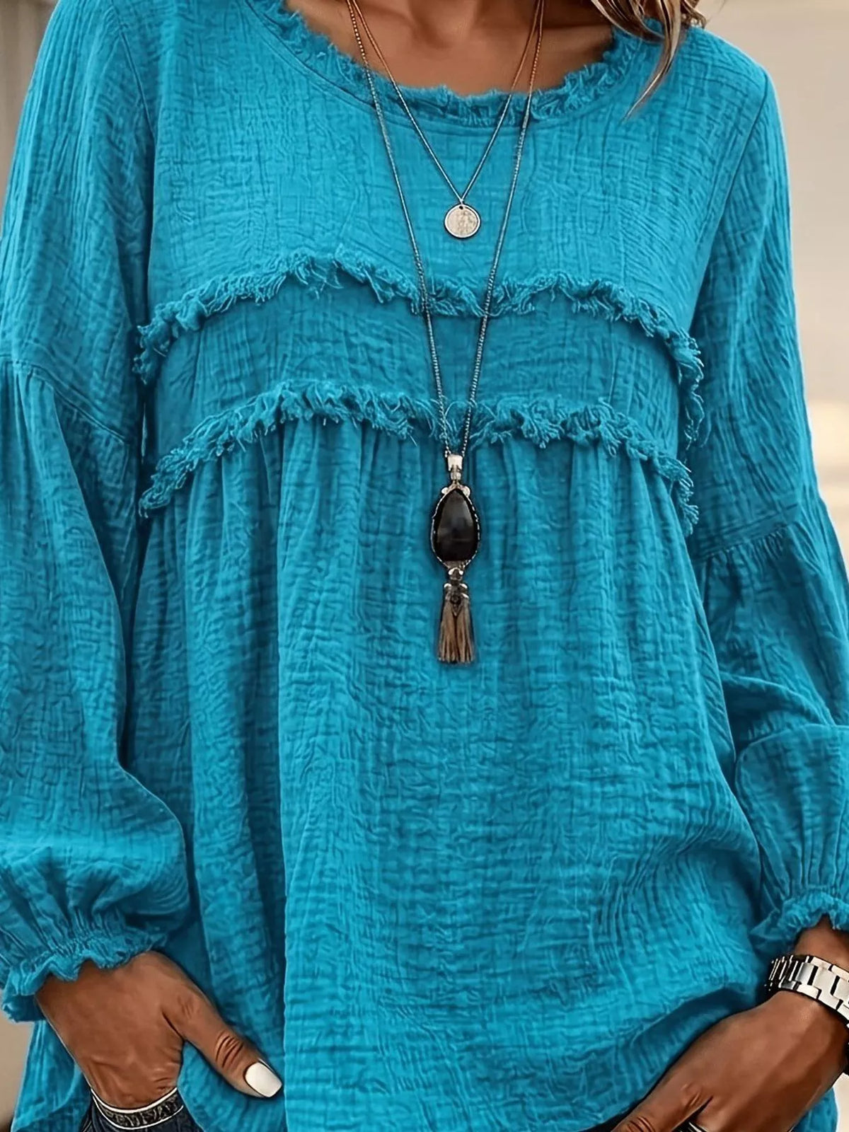 Teal textured frayed-trim peplum blouse