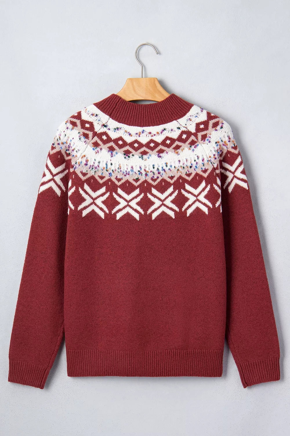 Burgundy Christmas geometric sweater, back on hanger