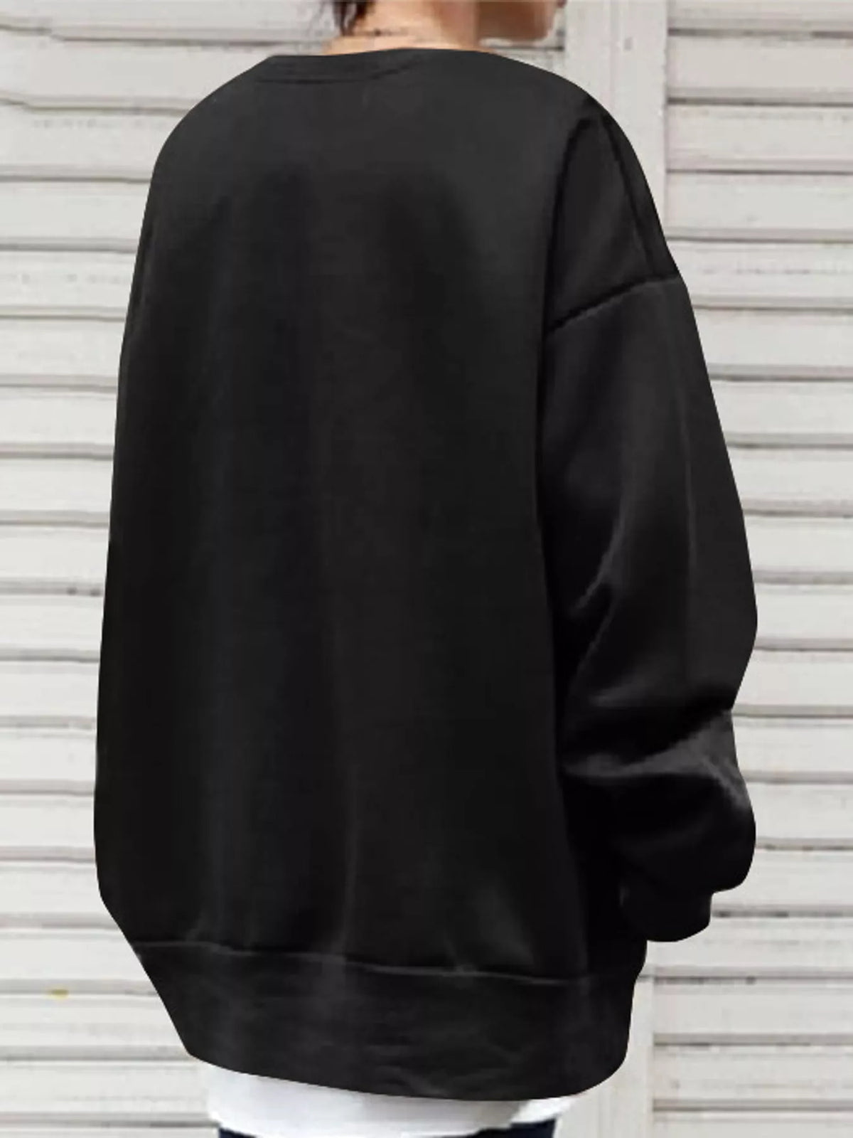 Black relaxed sweatshirt, back view