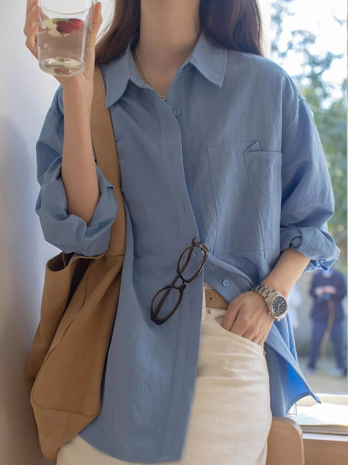 Blue button down long sleeve shirt, front view