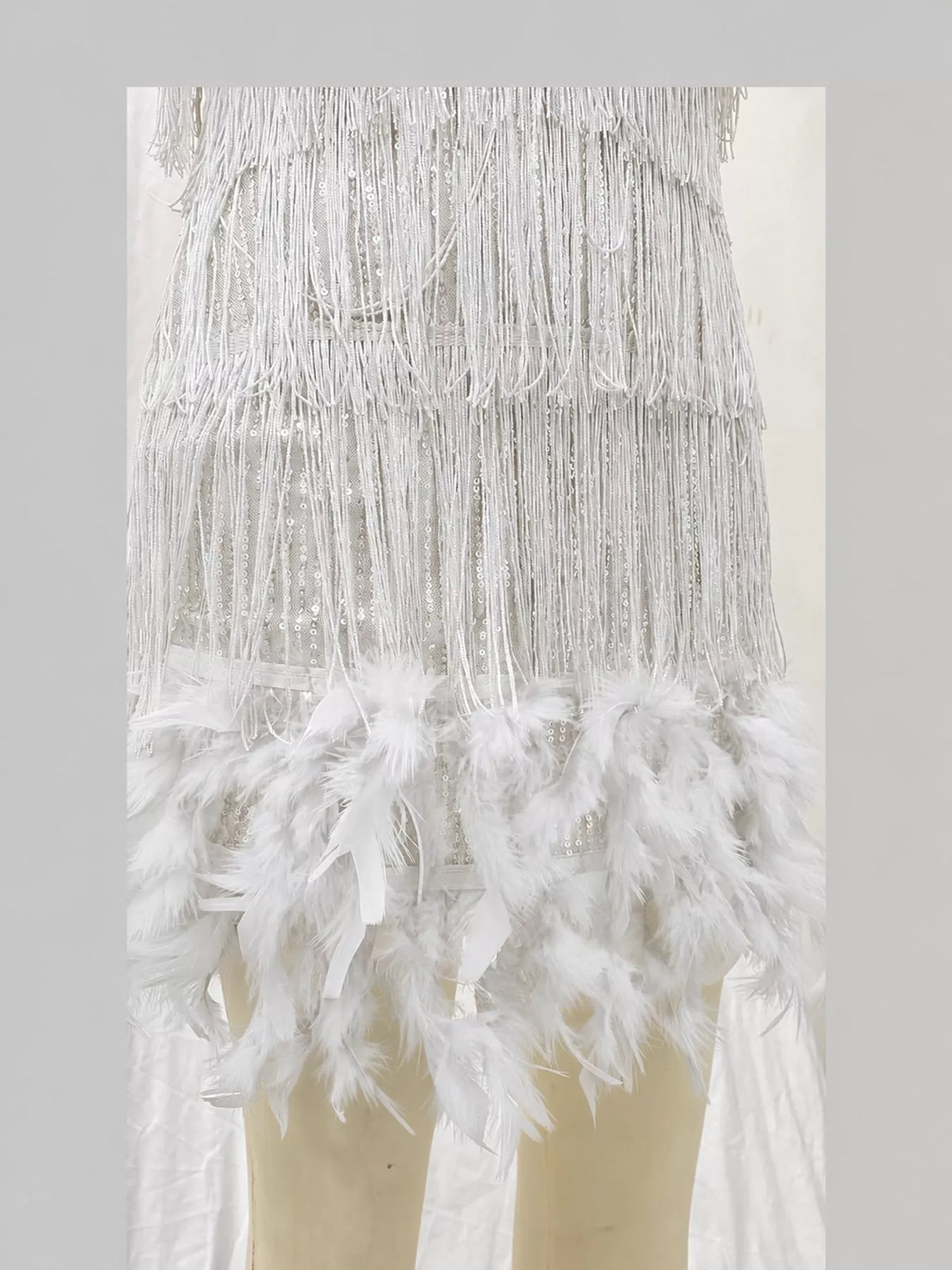 White feather fringe sequin mini dress, detail view