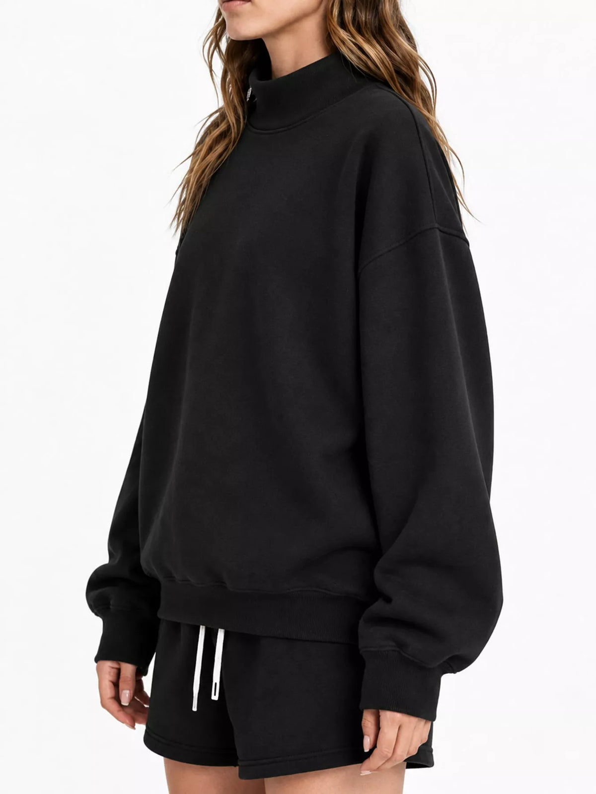 Black oversized dropped shoulder sweatshirt, side view