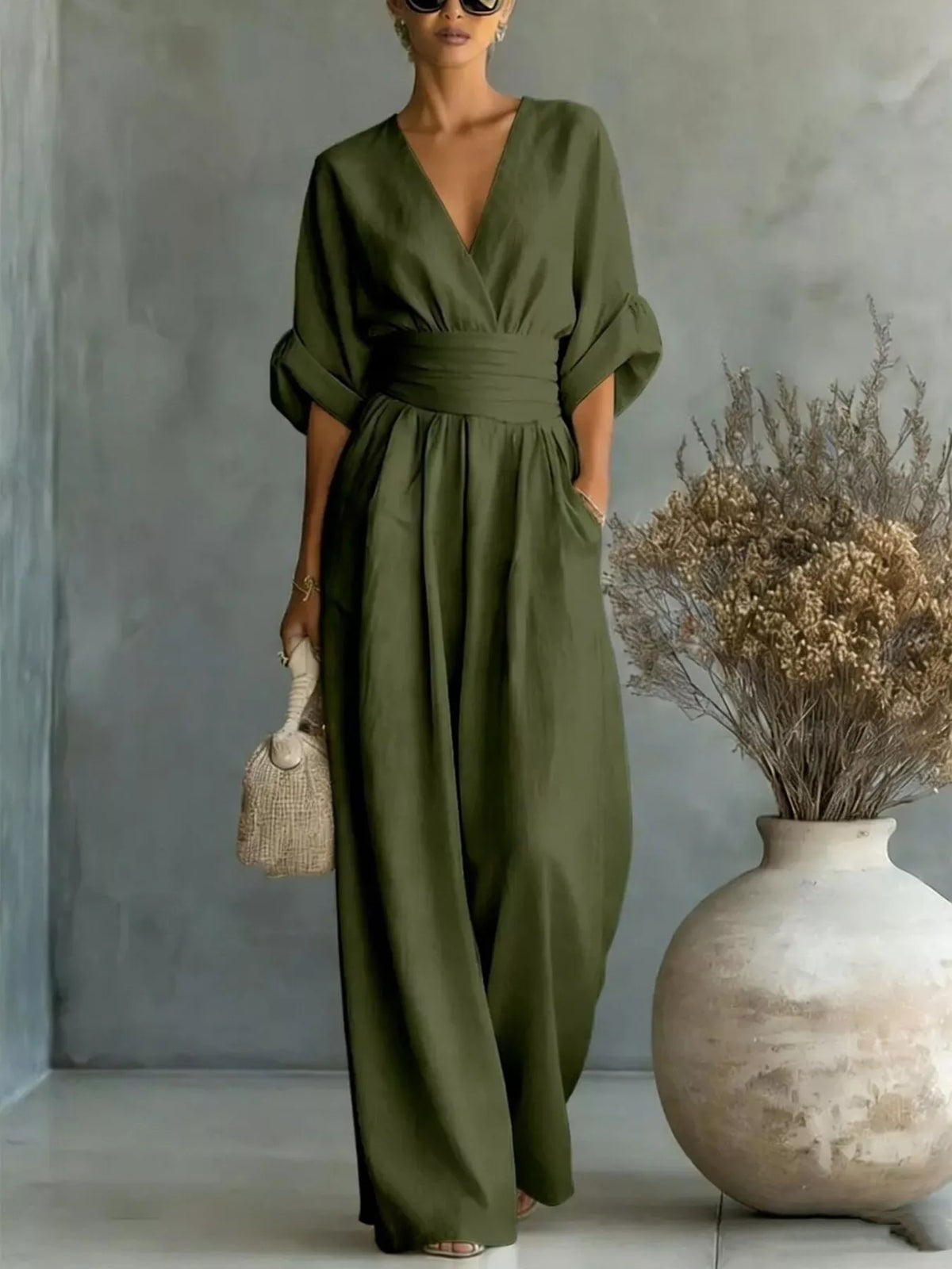 Olive green V-neck wide-leg jumpsuit, front view
