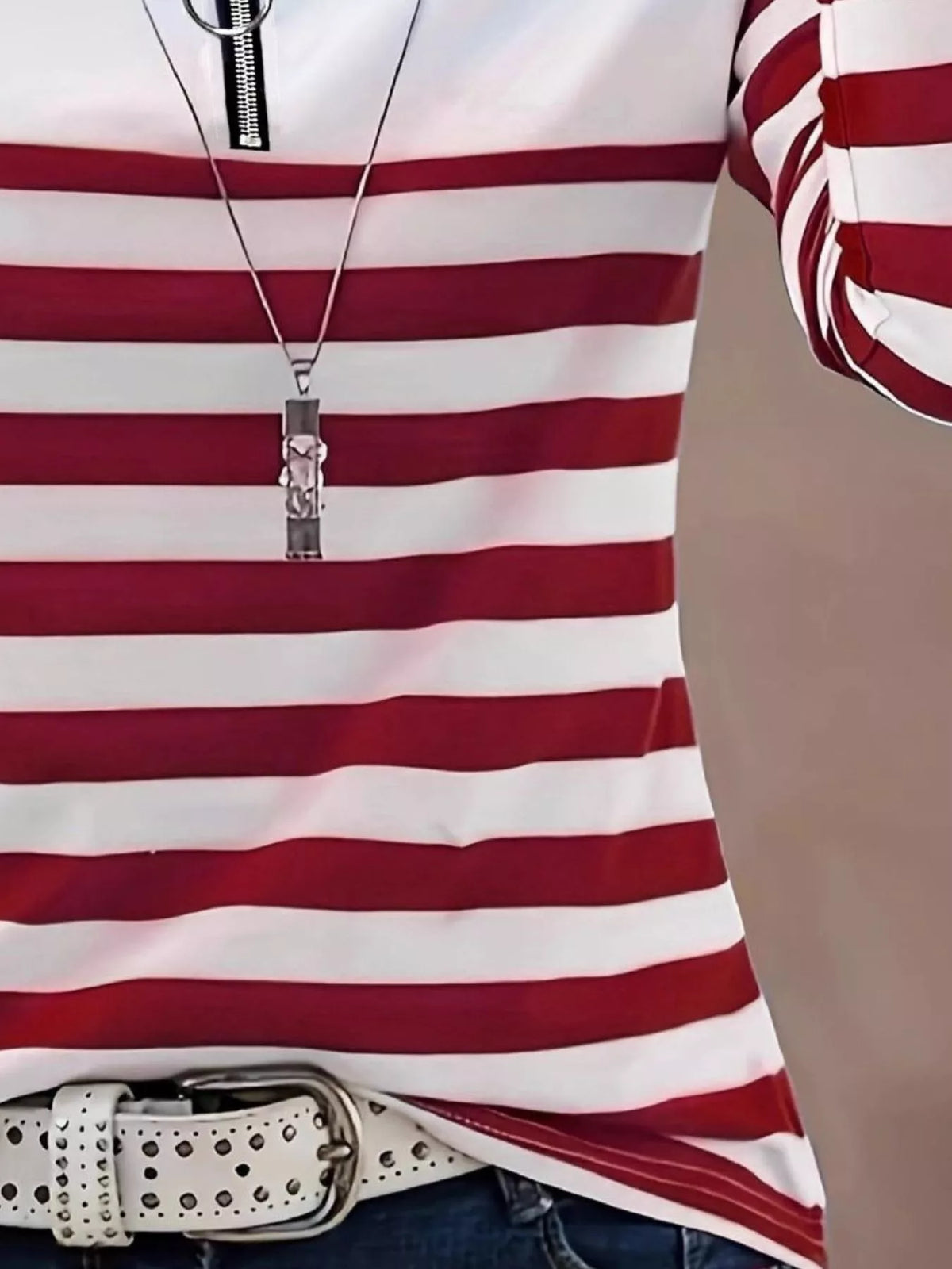 Red and white quarter-zip striped top, stripe detail