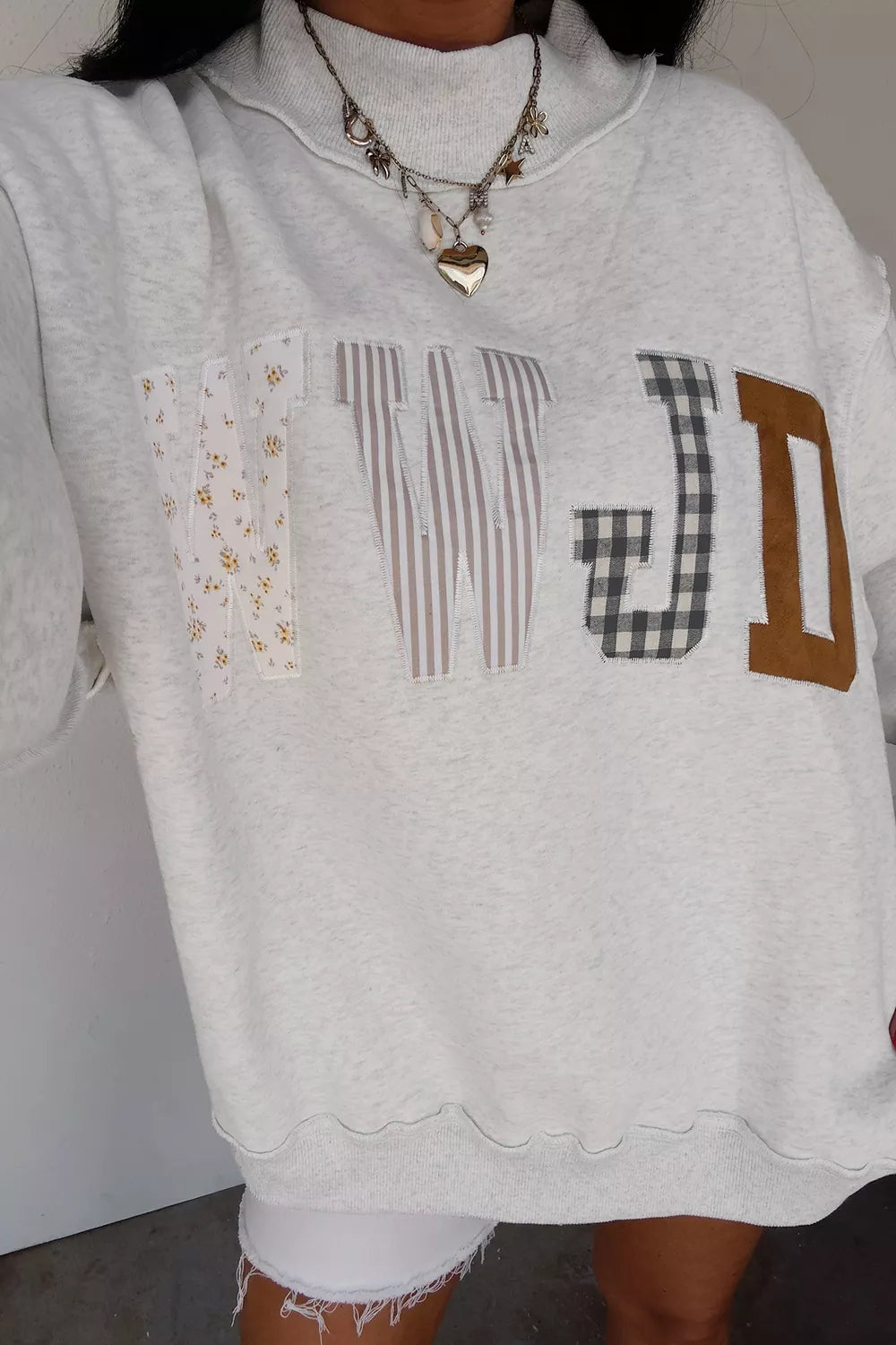 Trendsi WWJD Mix Pattern Letter Graphic Exposed Seam Loose Sweatshirt -