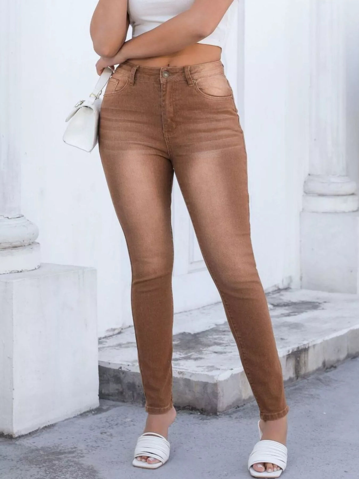 High-waisted slim-fit jeans