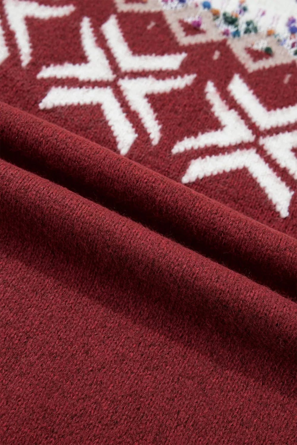 Burgundy Christmas geometric sweater, knit pattern close-up