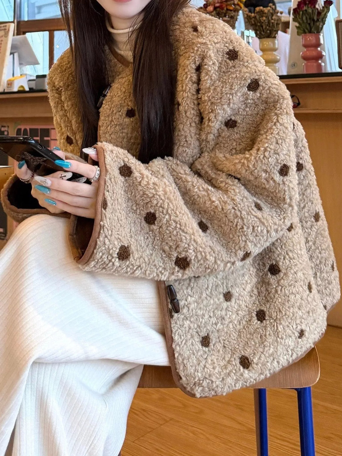 Beige with brown polka dots polka dot toggle jacket, side view