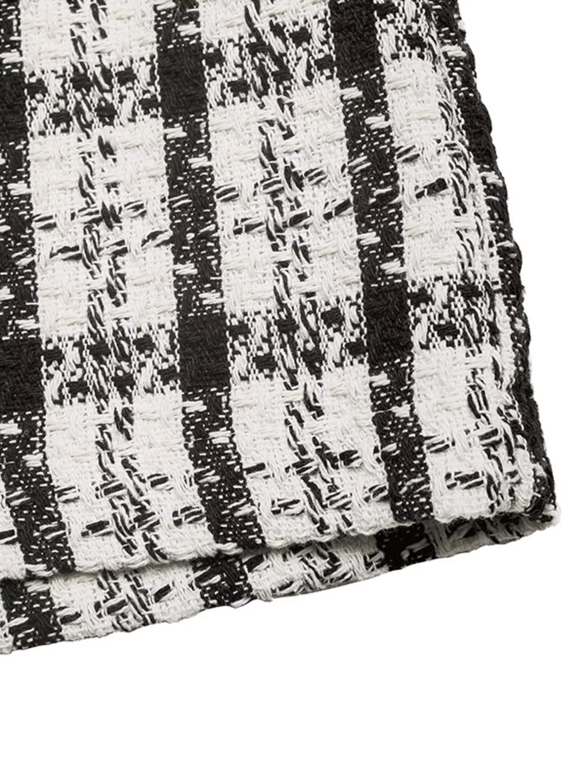 Black and white plaid midi skirt, hem detail