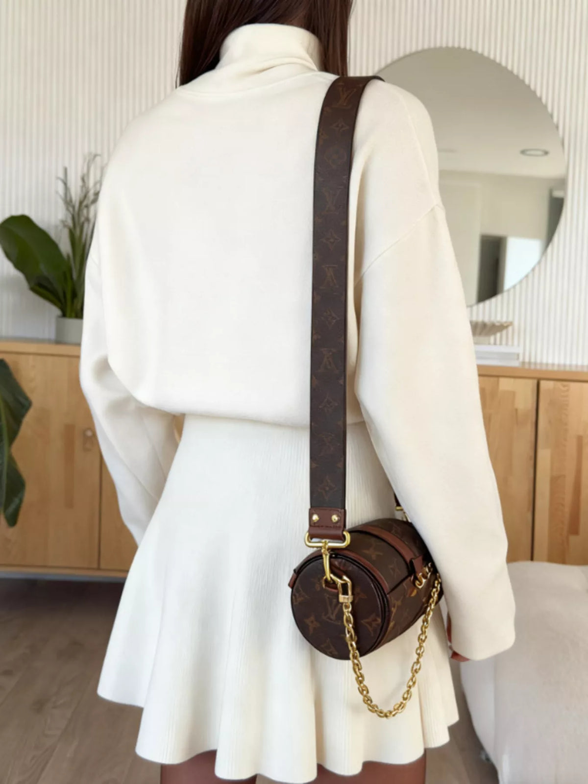 Cream mock neck knit top and flared skirt set, back view