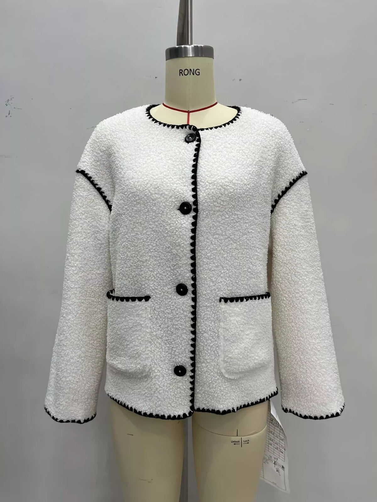 Cream with black trim faux shearling contrast trim button-down jacket