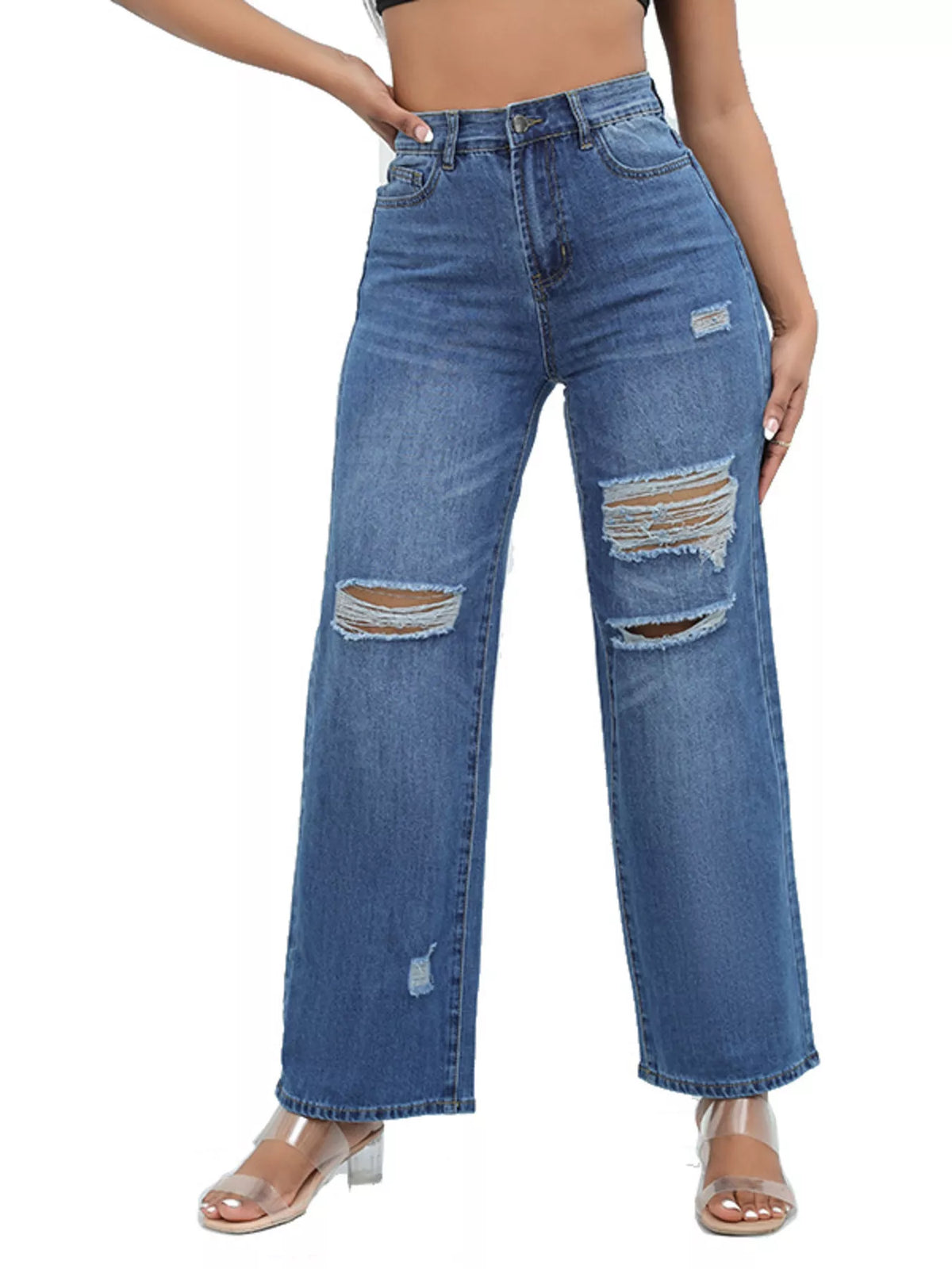 Dark blue distressed wide-leg jeans, front view with hand at hip