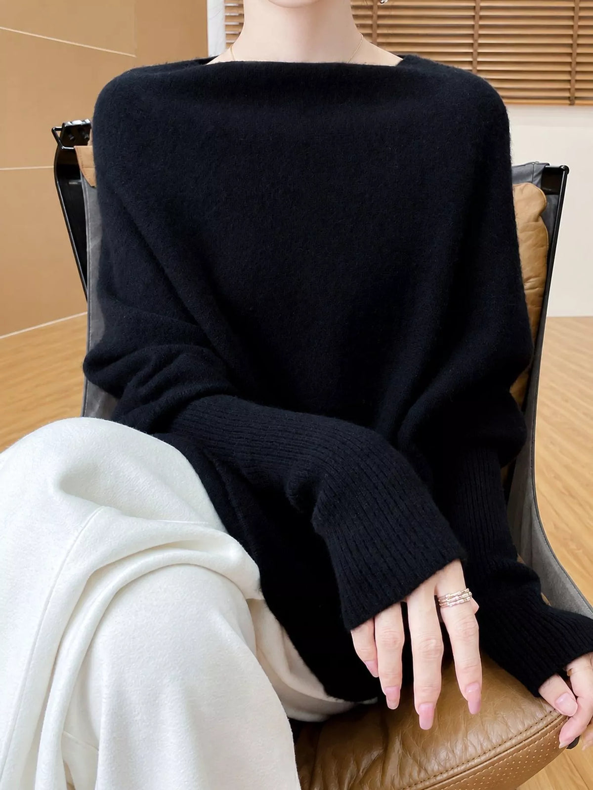 Navy asymmetrical lantern sleeve sweater — front view