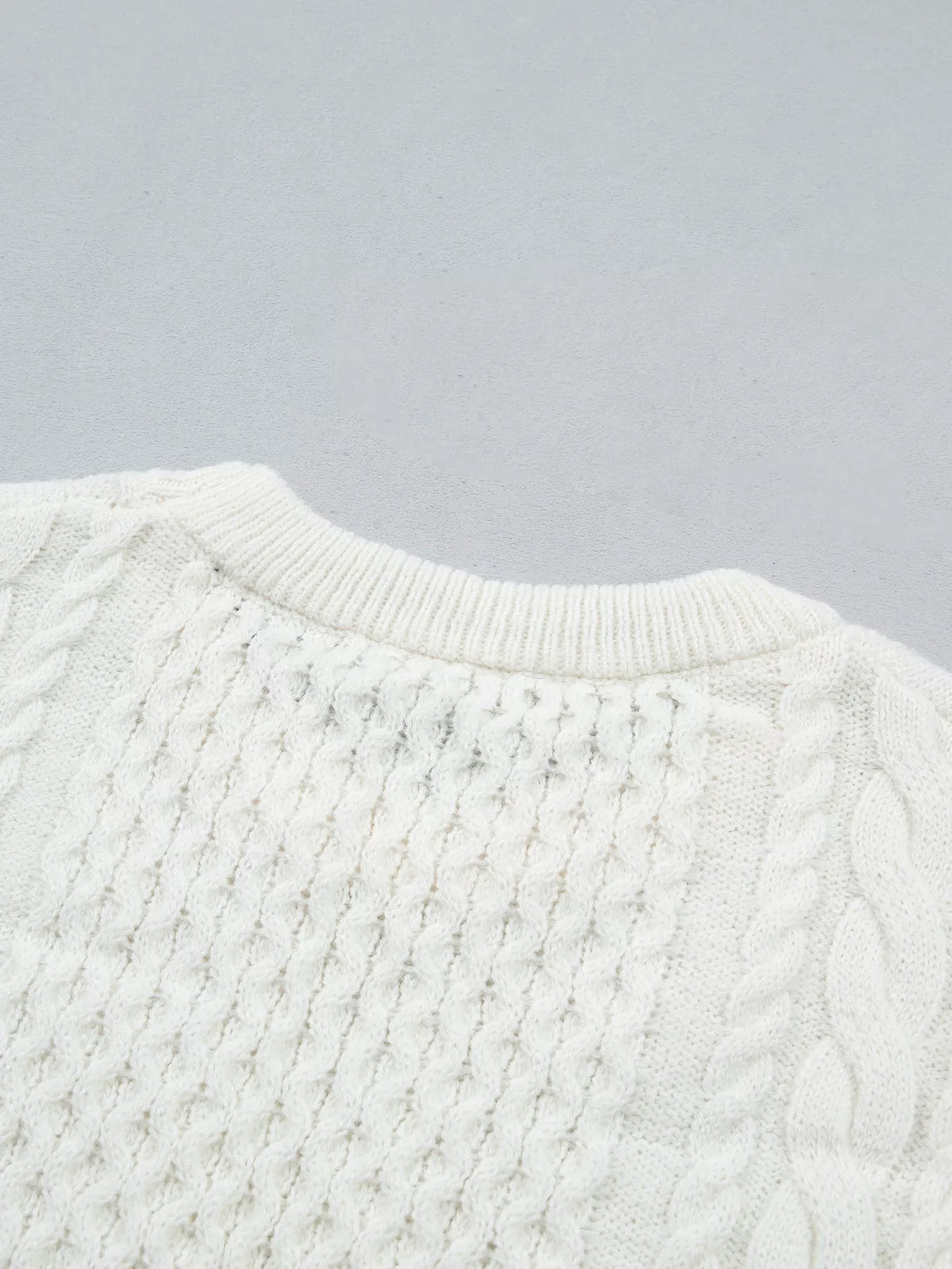 Cable Round Neck Sweater in white, construction detail