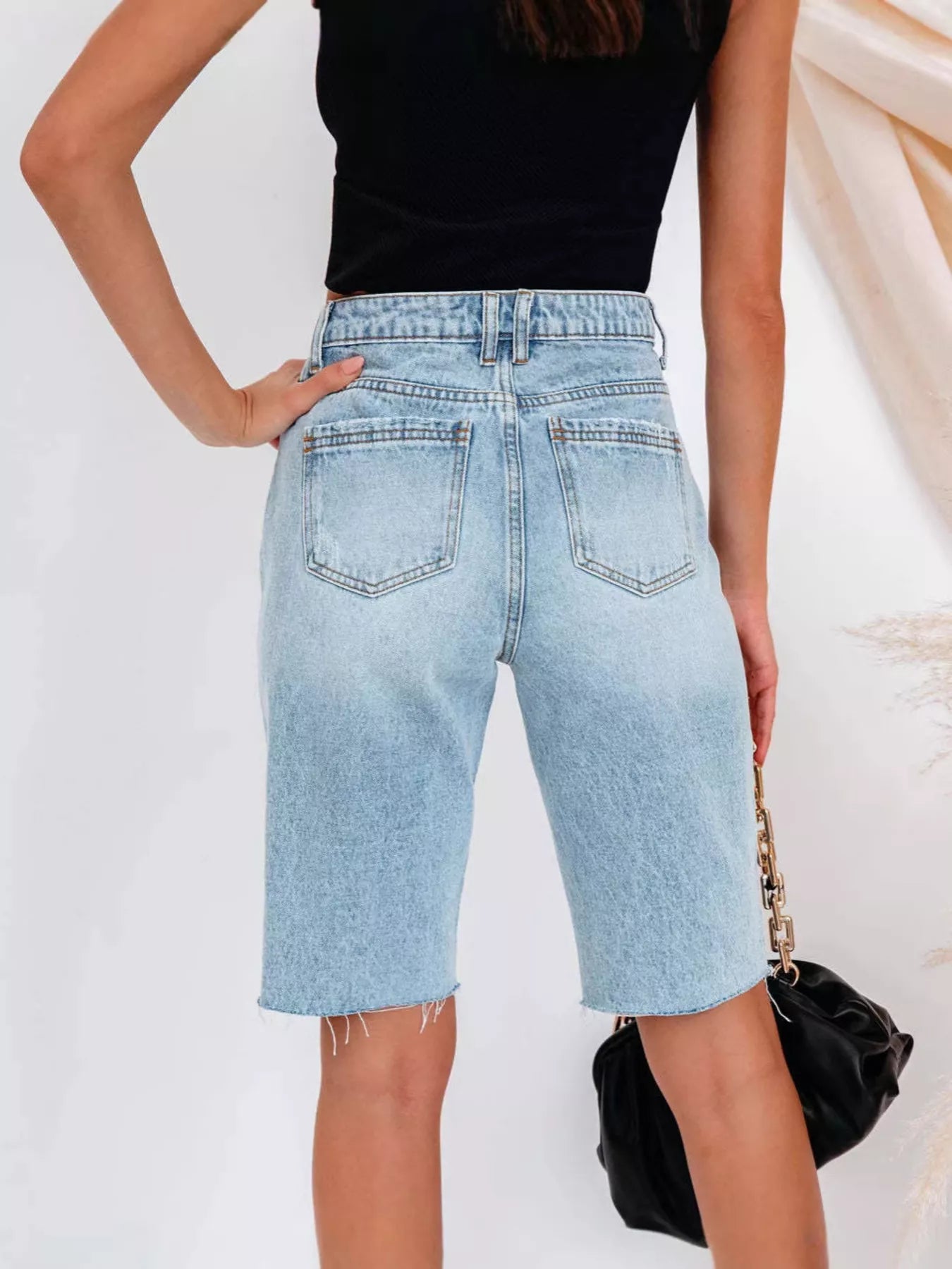 Trendsi High-Waisted Distressed Denim Shorts -