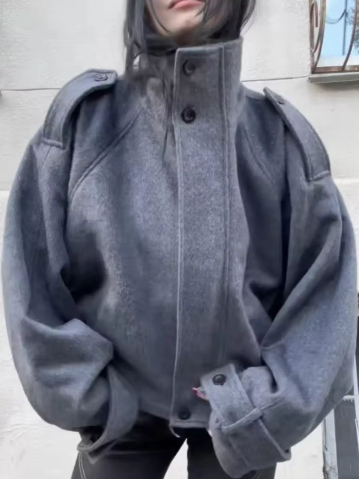 Gray zip-up stand-collar jacket — front view
