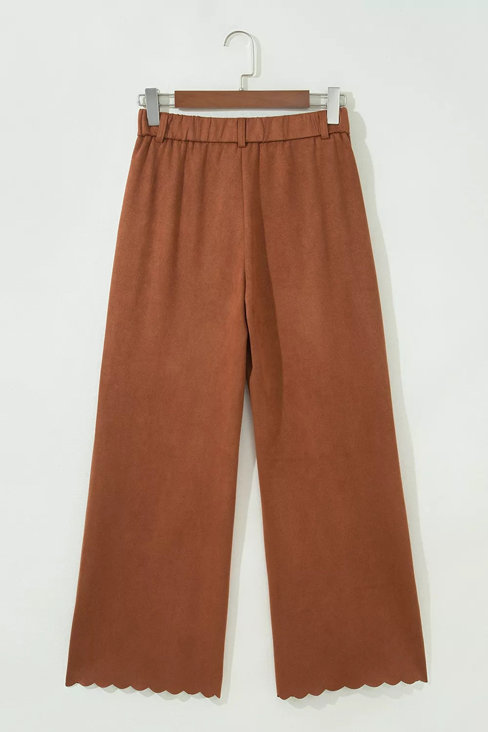 Brown scalloped-pocket wide-leg pants, back on hanger