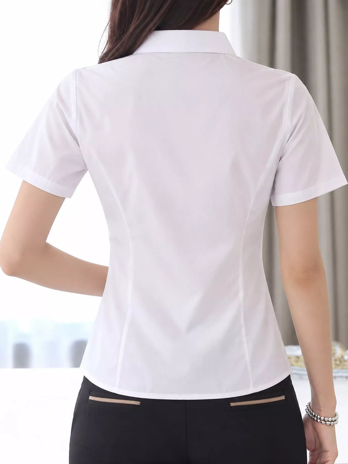 White button-down shirt, back view