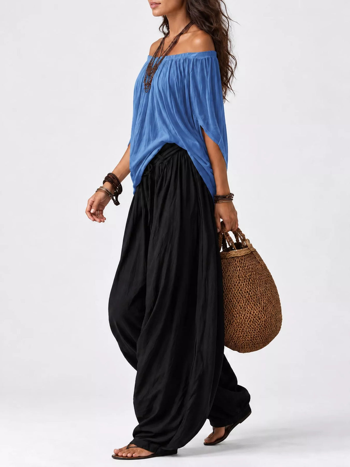 Blue top and black pants off-shoulder top and wide-leg harem pants set — side view
