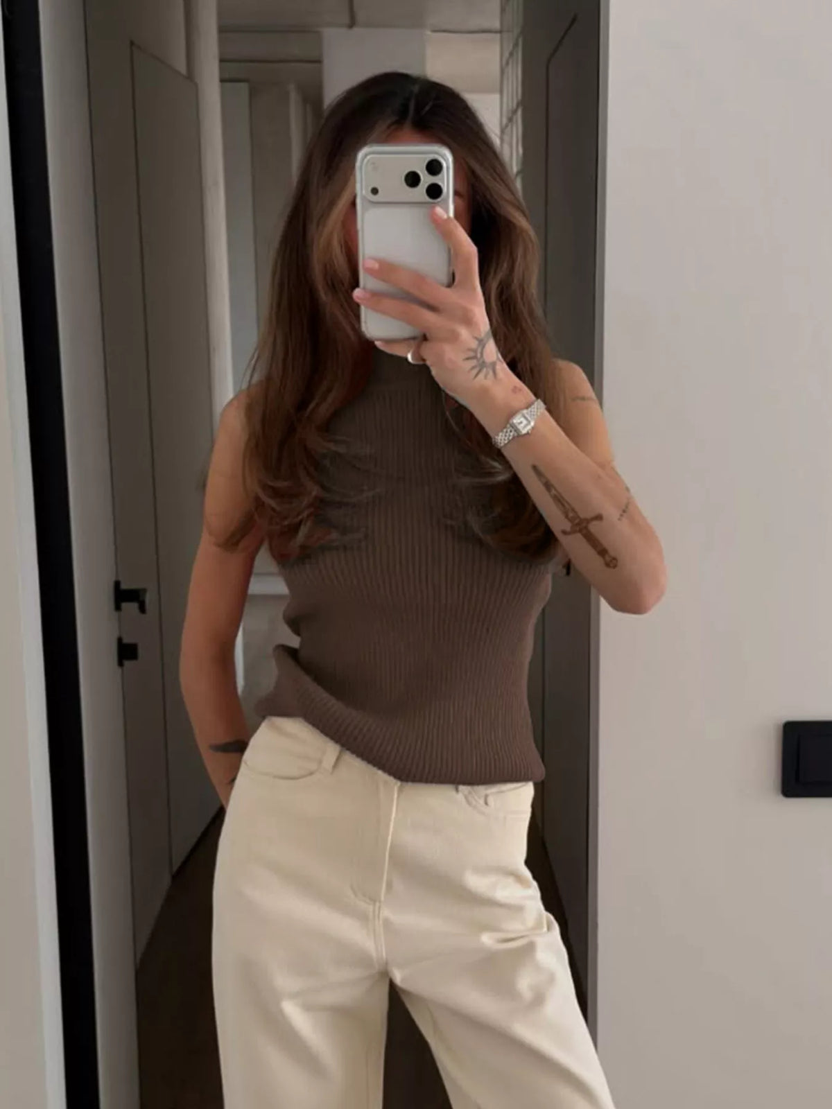 Brown ribbed halter-neck tank, front mirror view