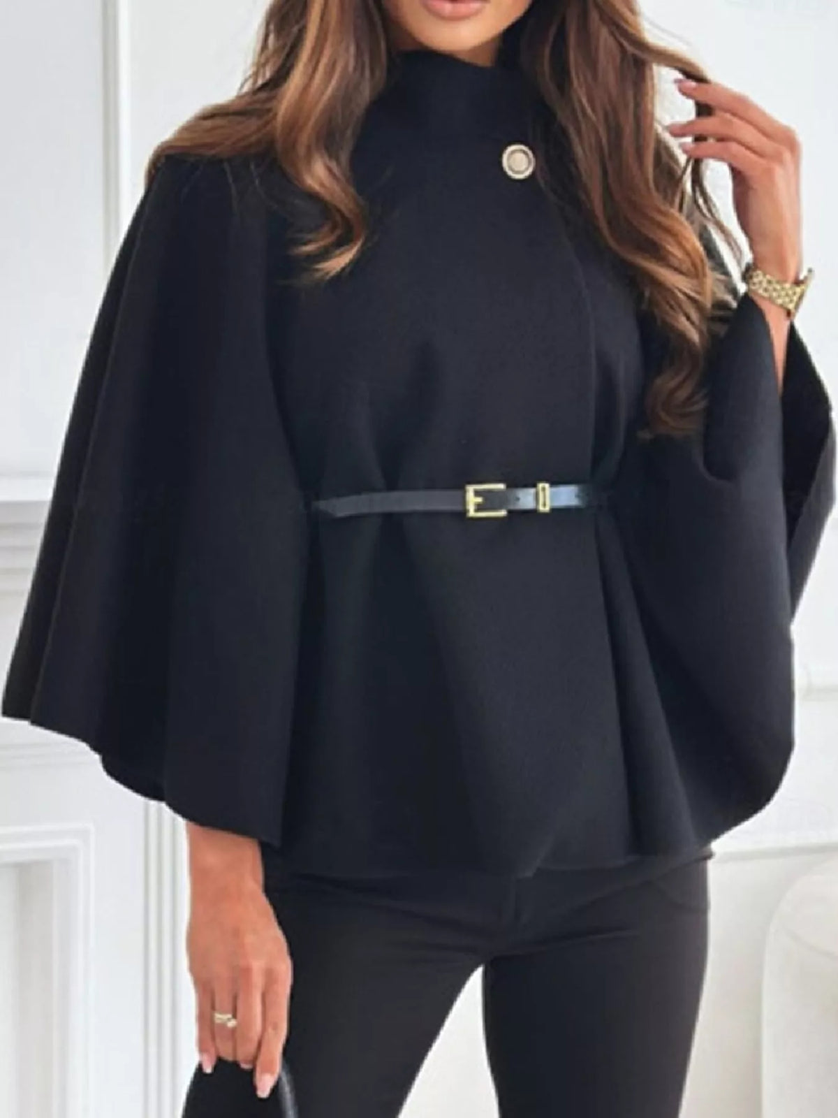 Belted Mock Neck Cape in black, front view