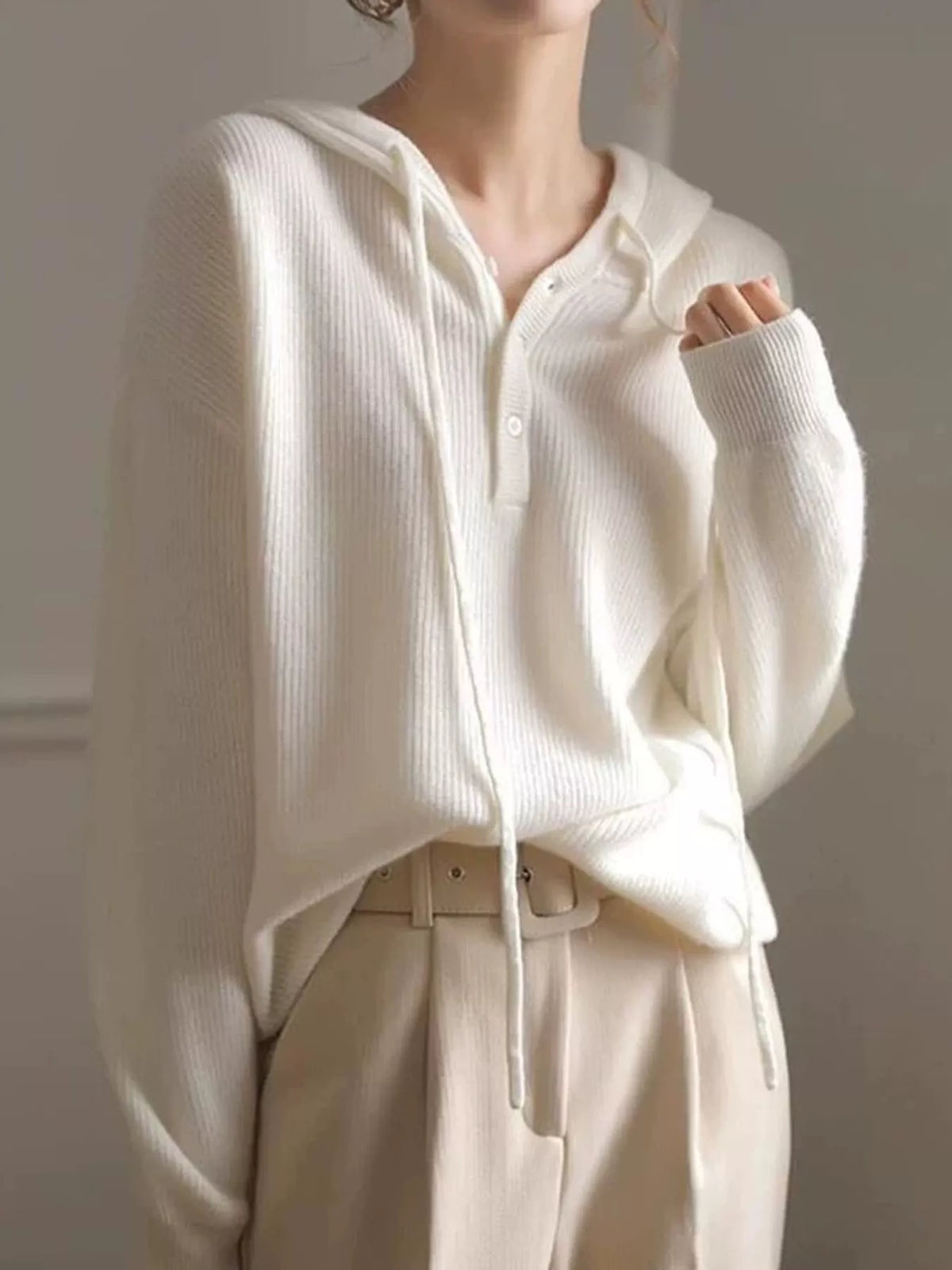 Hooded long sleeve sweater, front view on model
