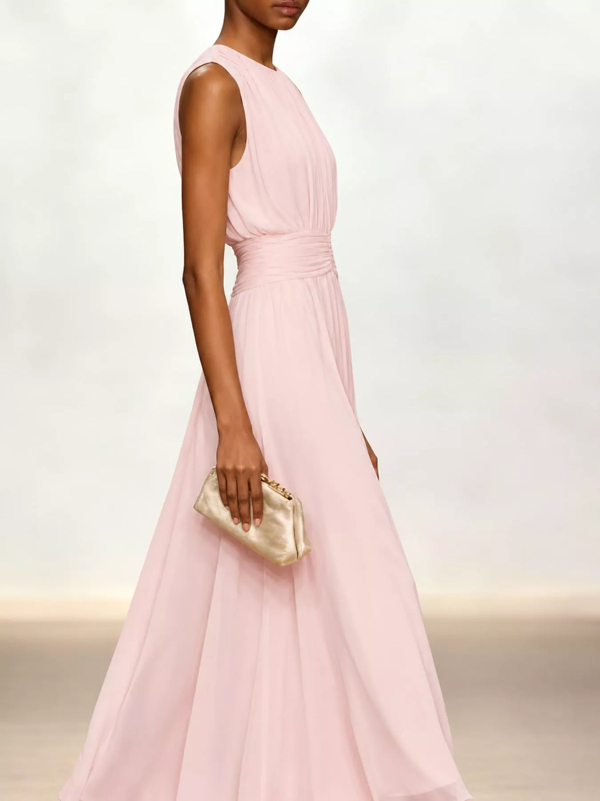 Pink sleeveless ruched chiffon maxi dress, side view