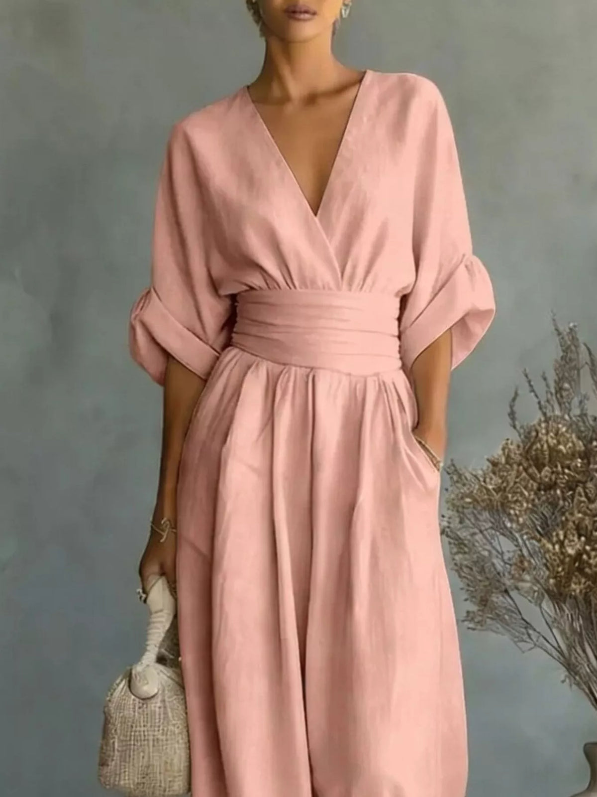 Pink V-neck wide-leg jumpsuit, bodice detail