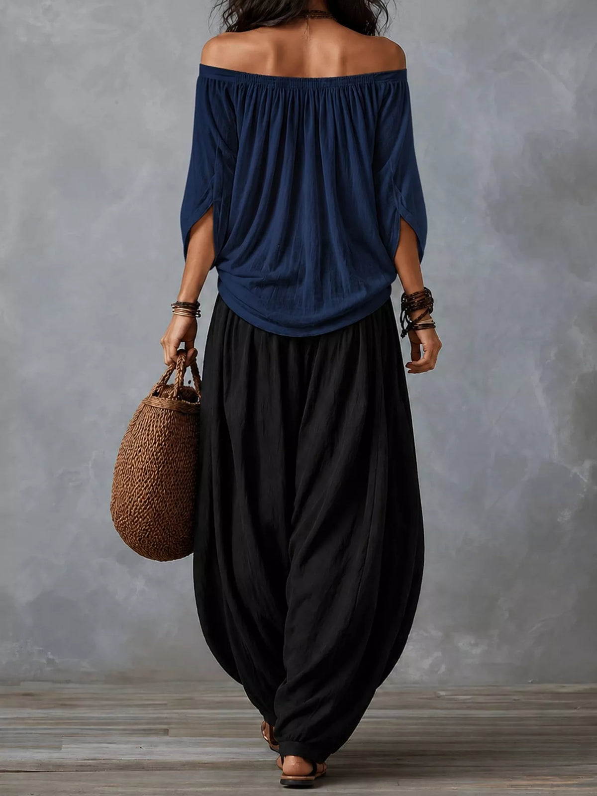 Navy top and black pants off-shoulder top and wide-leg harem pants set — back view