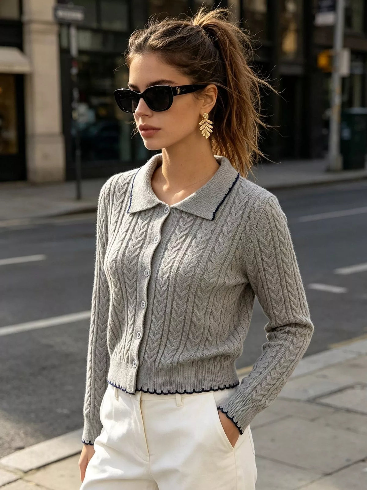 Gray cable-knit polo-collar cardigan, standing front view.