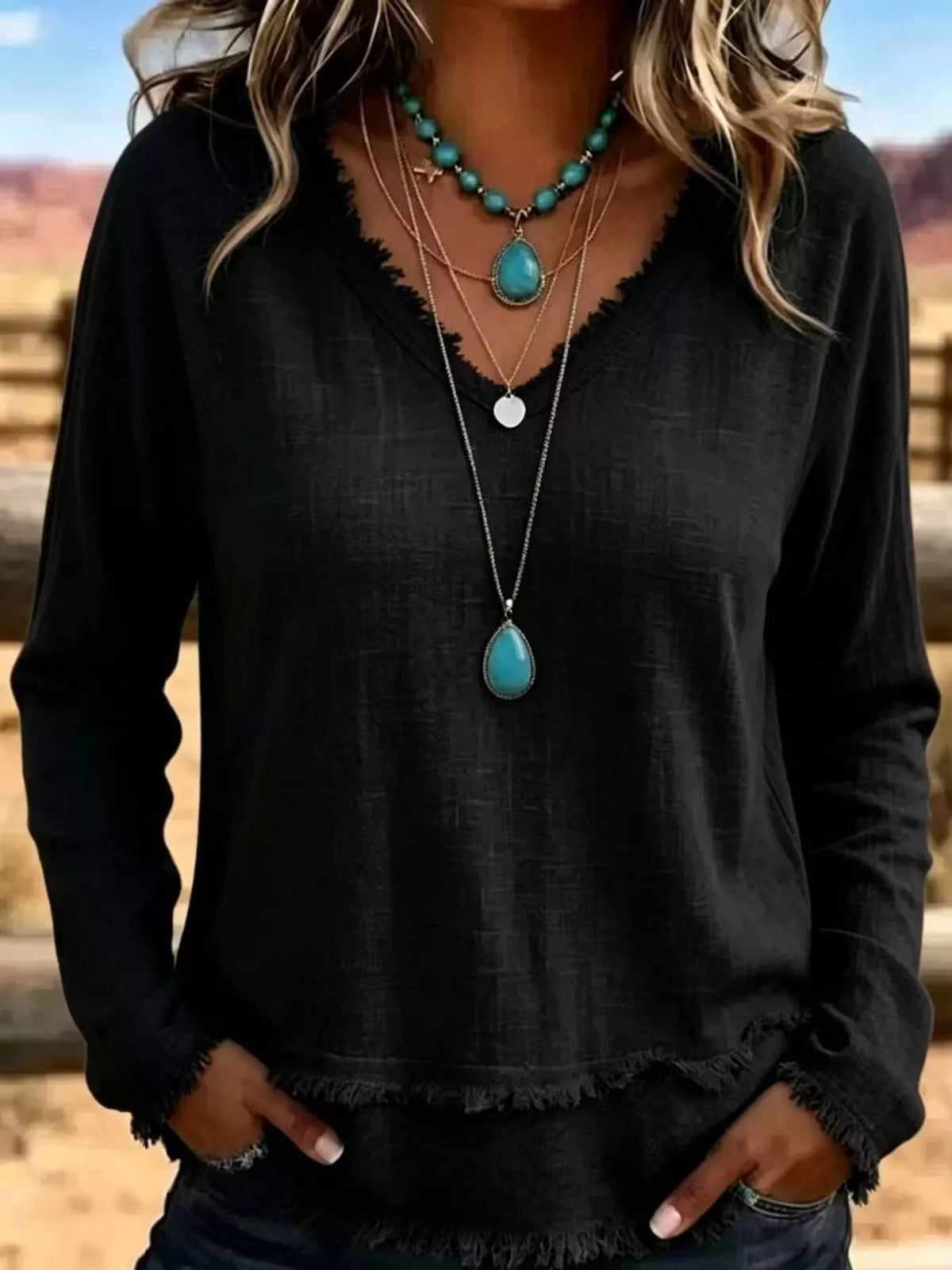 Frayed-hem blouse, black front on model