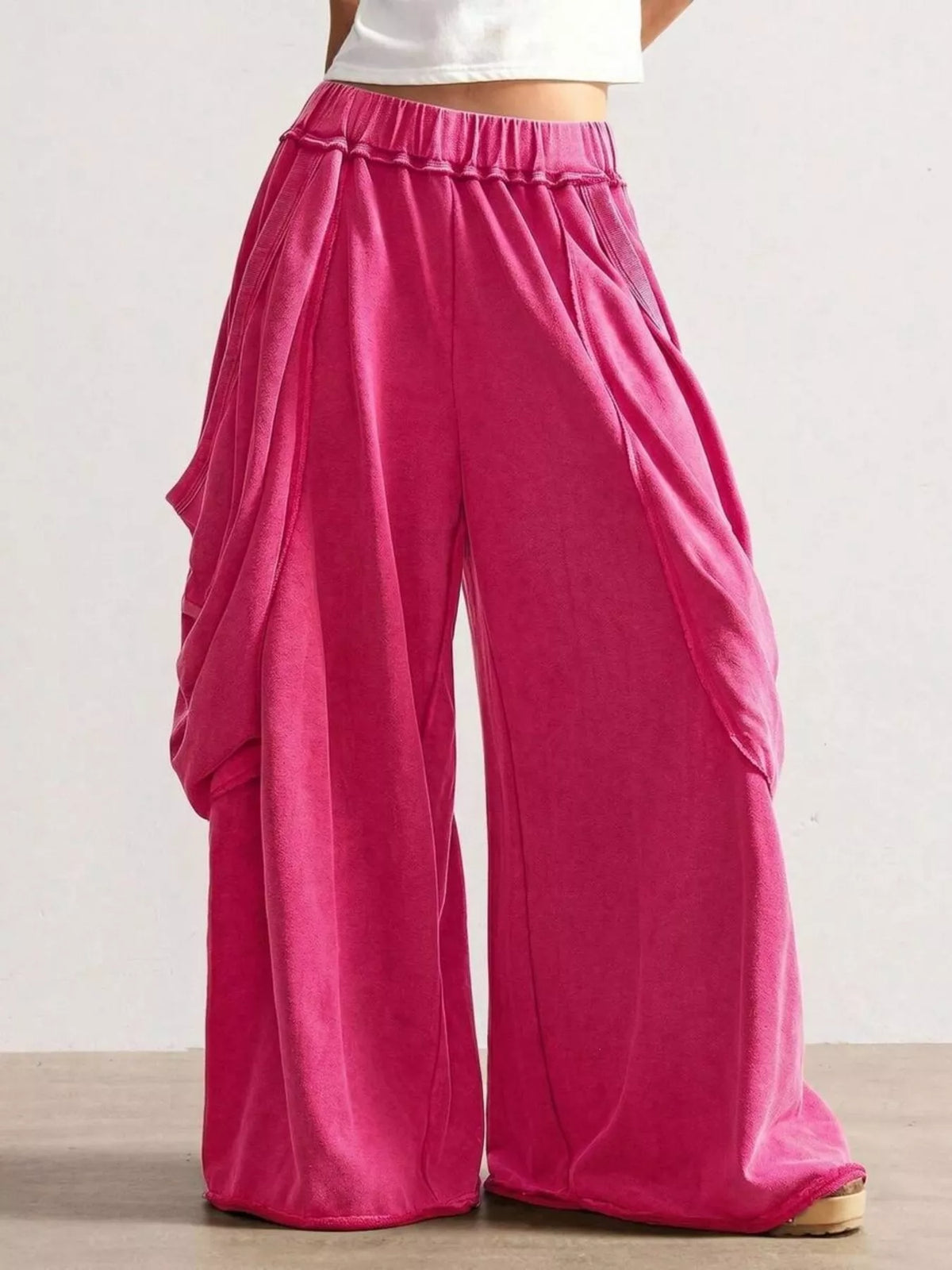 Pink wide-leg cargo pants, front view