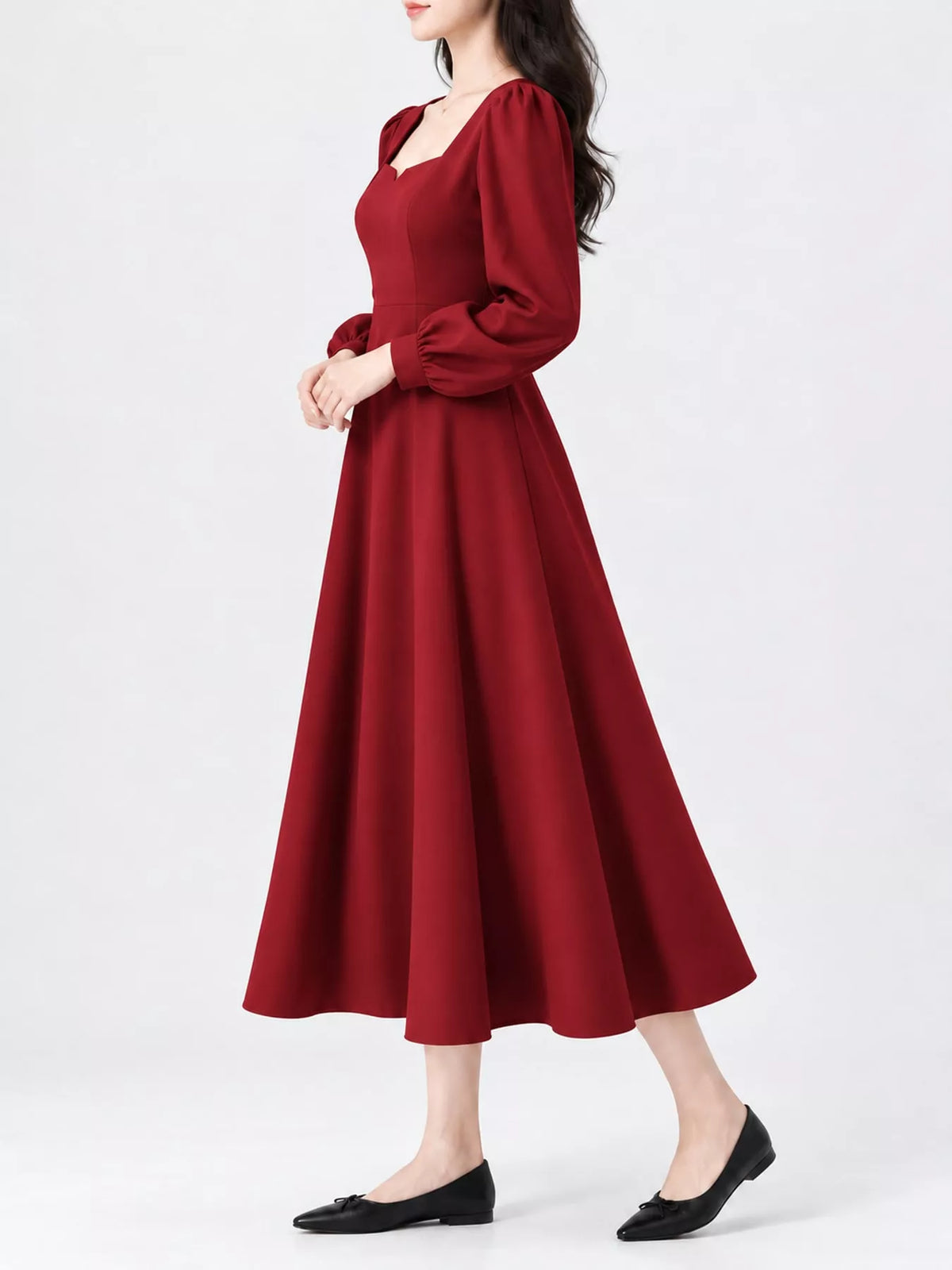 Burgundy long sleeve a line midi dress, side view