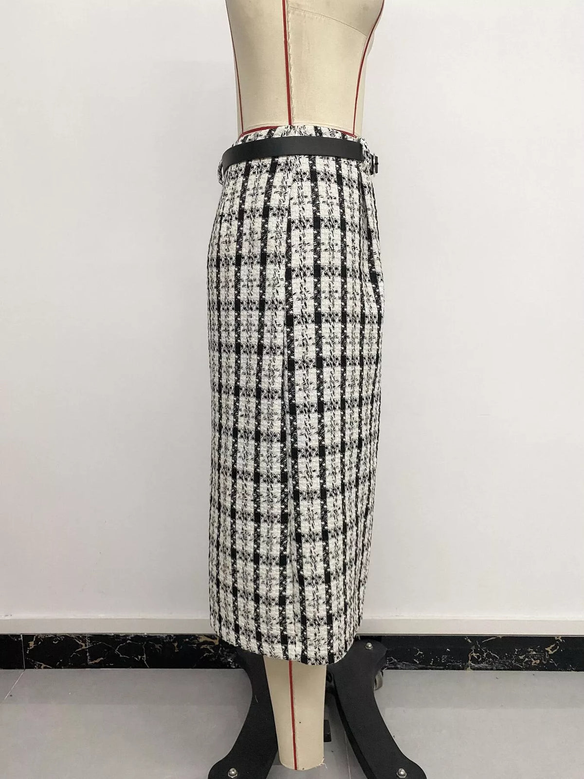 Black and white plaid midi skirt, side on mannequin