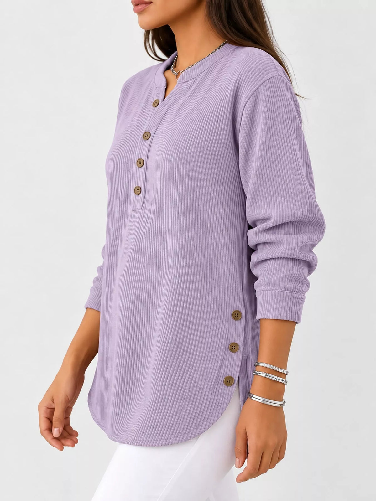 Purple button detail long sleeve top, side view