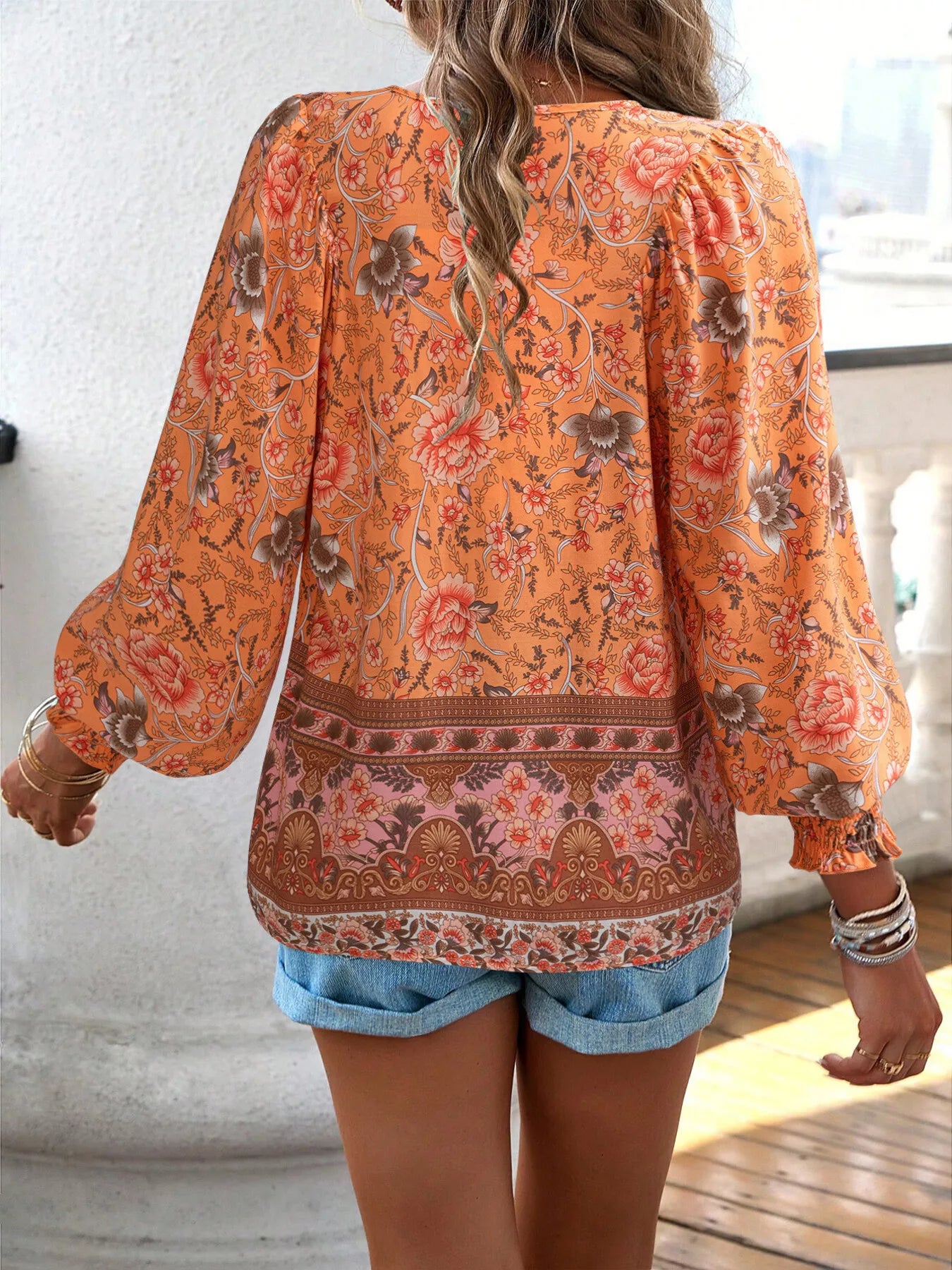 Trendsi Floral Print Tie-Neck Blouse with Smocked Cuffs -