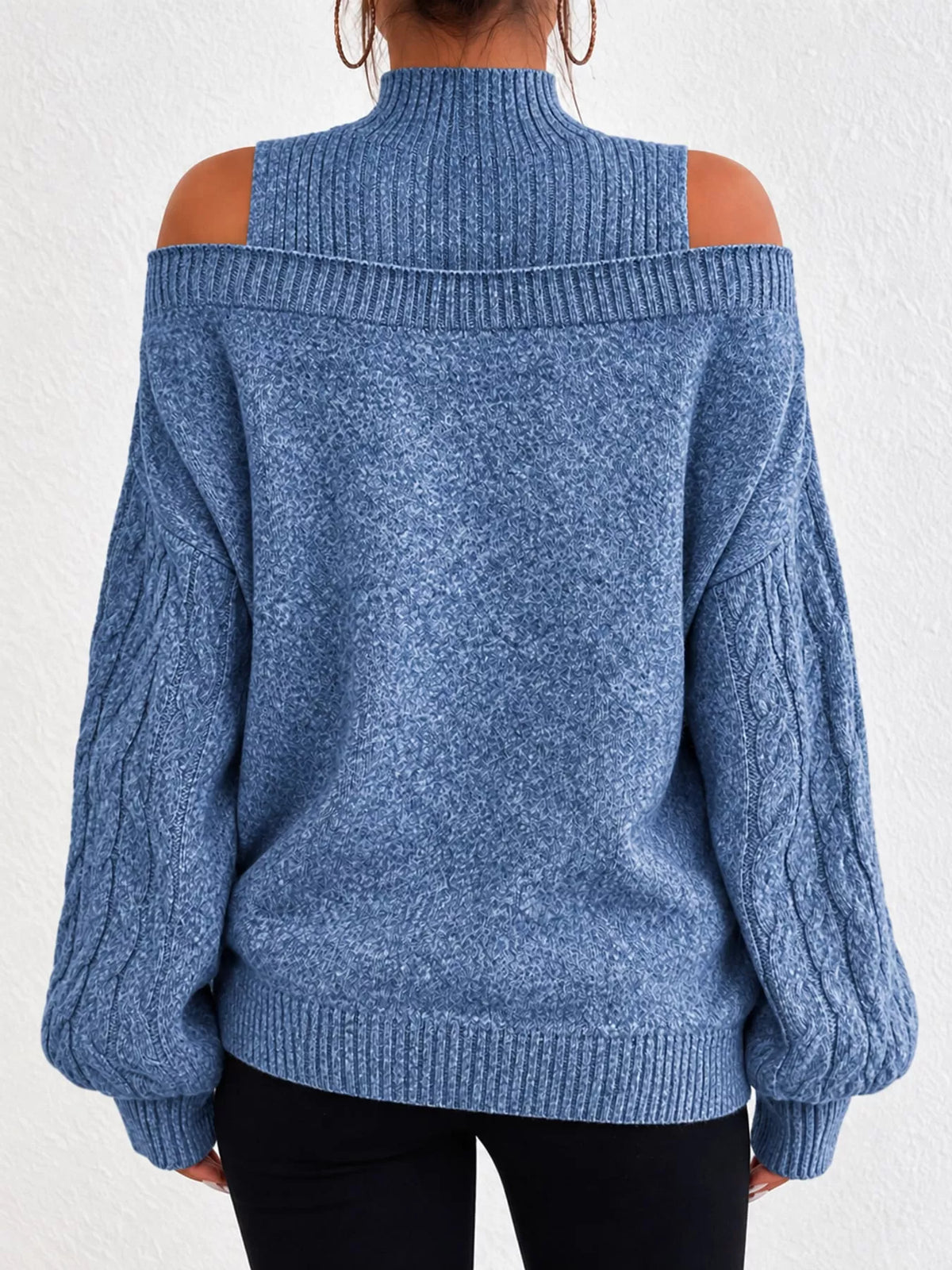 Blue cold shoulder mock neck cable knit sweater, back view