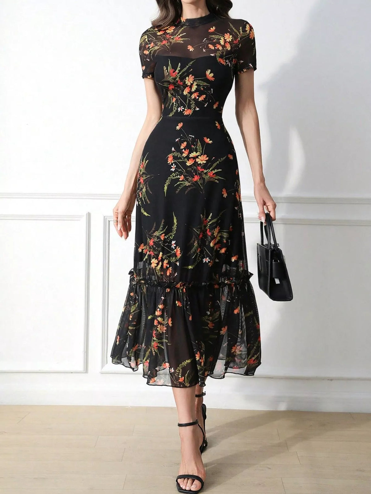 Black floral sheer-overlay midi dress with ruffle hem