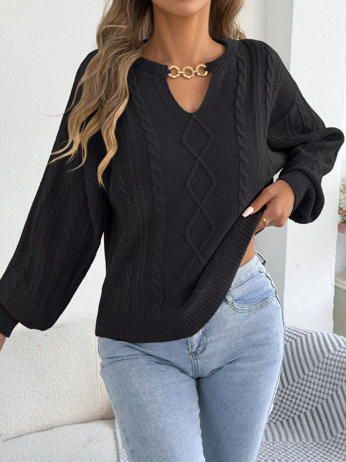 Black cable knit notched sweater