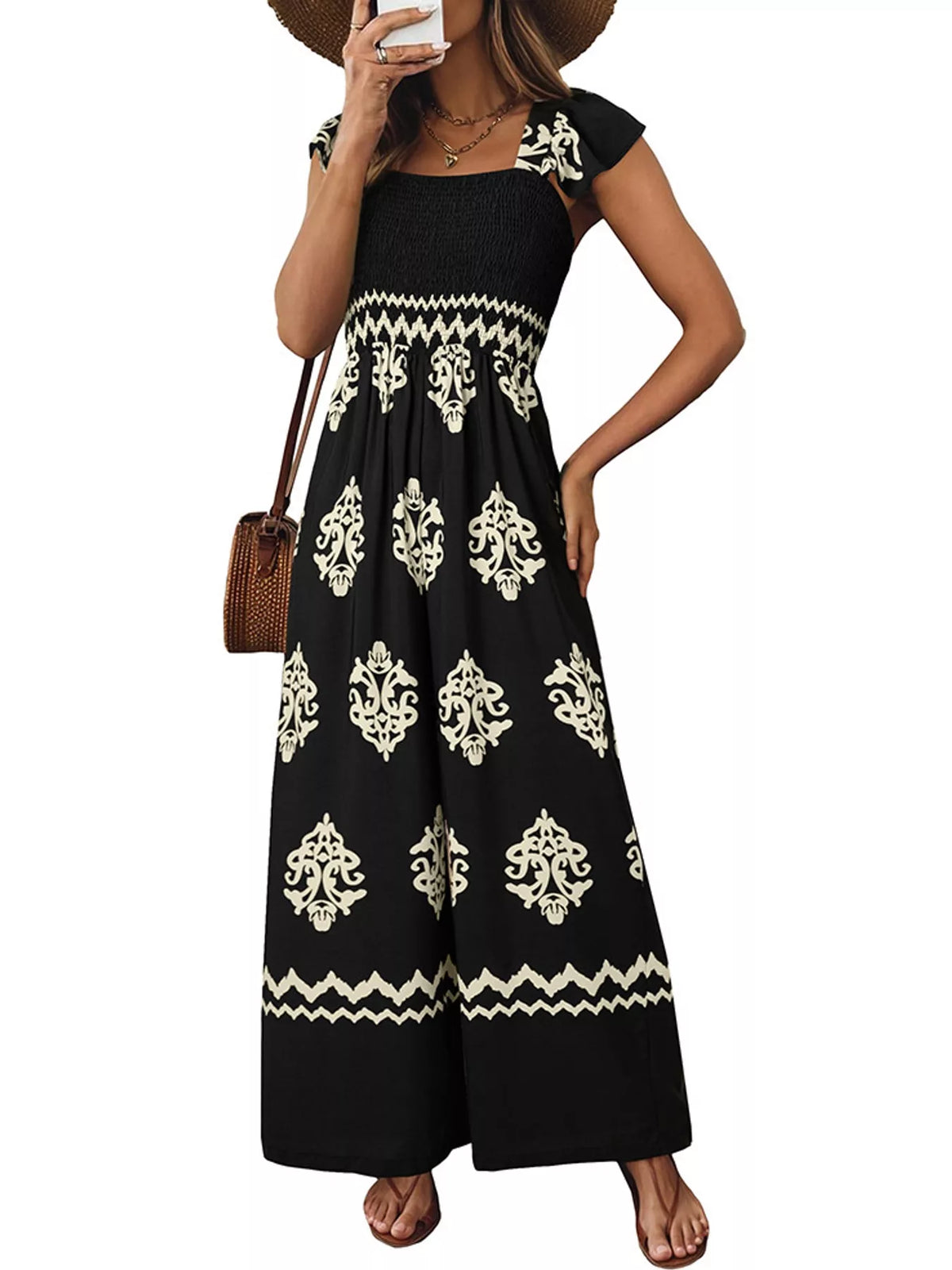 Black wide-leg ornamental-print short-sleeve jumpsuit