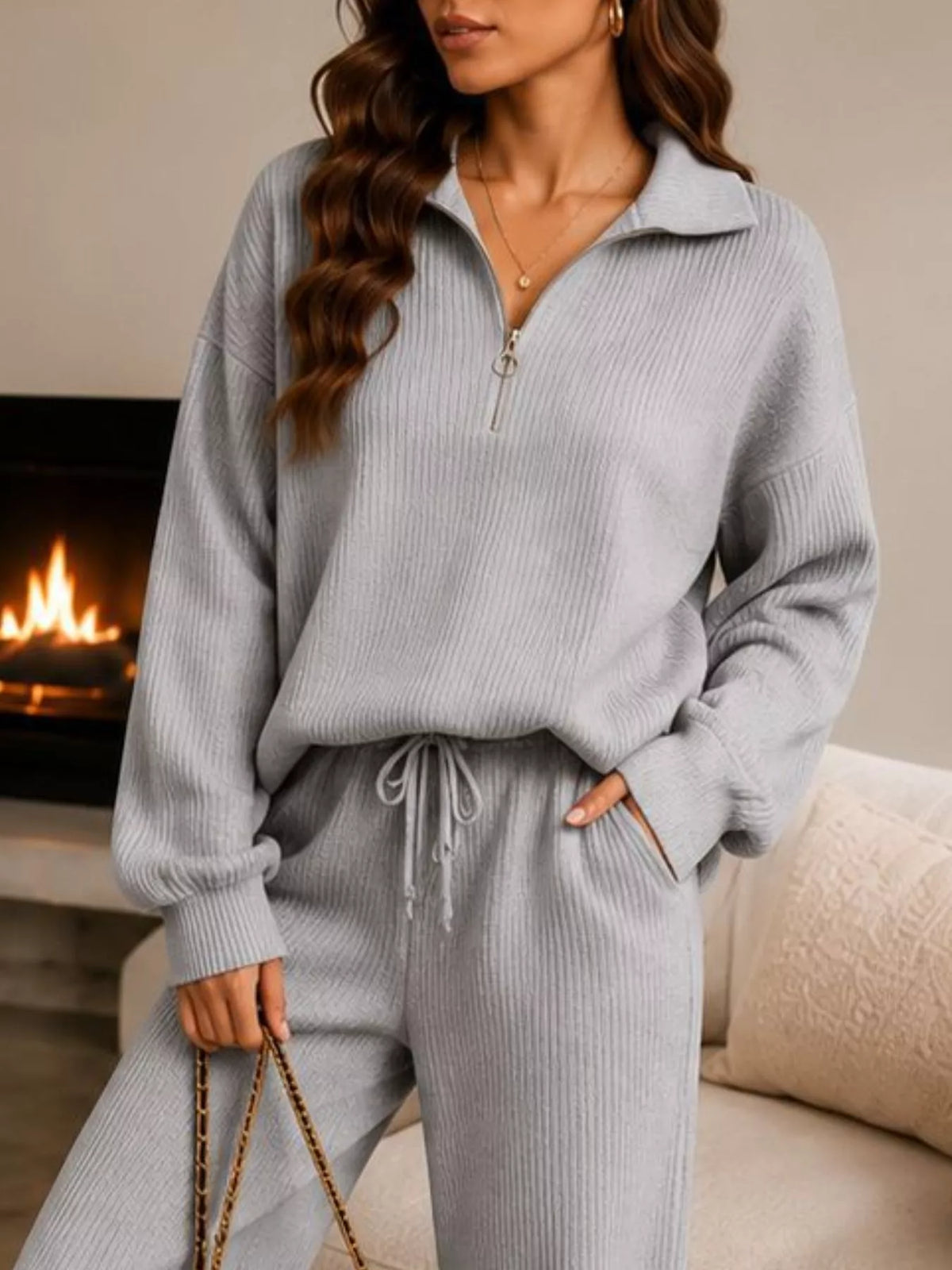 Gray quarter-zip knit top and pants set, zip neckline and waist detail