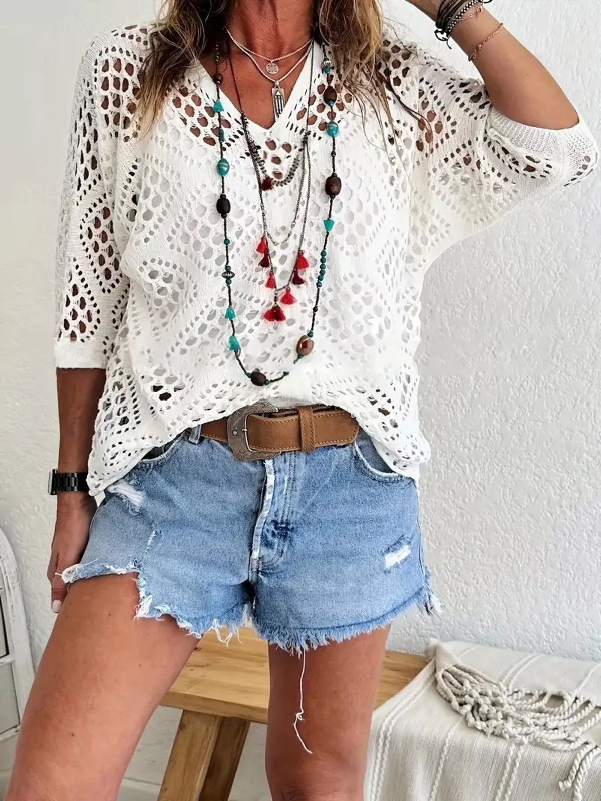 White openwork crochet cover-up, front view