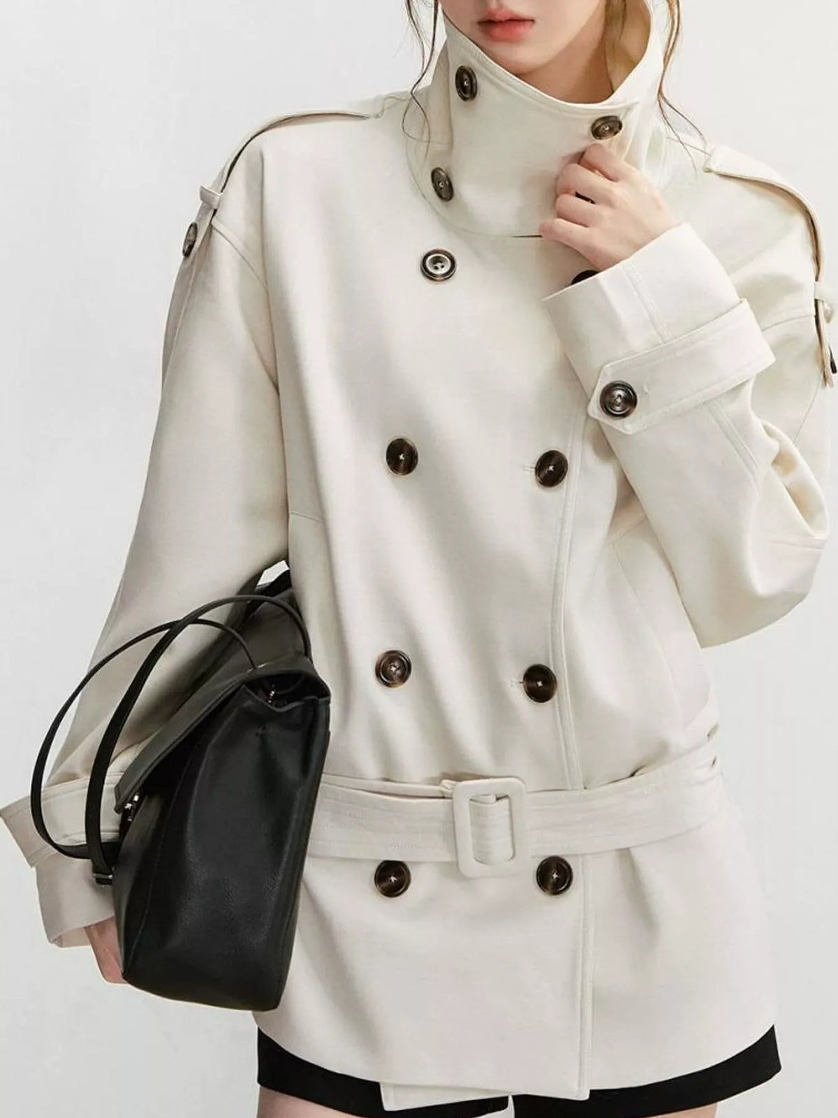 Cream double-breasted high-neck belted trench coat